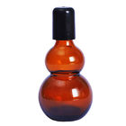 Bottiglie di olio essenziale di Amber Glass Odm Roll On della zucca a fiaschetta con la palla di massaggio di acciaio inossidabile