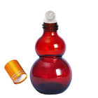 Bottiglie di olio essenziale di Amber Glass Odm Roll On della zucca a fiaschetta con la palla di massaggio di acciaio inossidabile